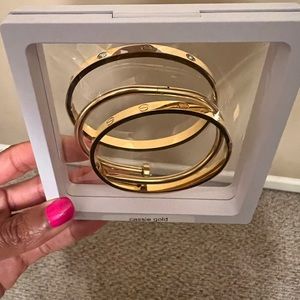 3 Gold bangle bracelets. These ARE NOT designer bracelets.
